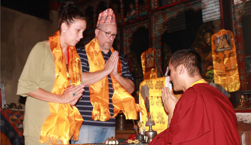 Pete and Natalie are observing Lama’s blessing