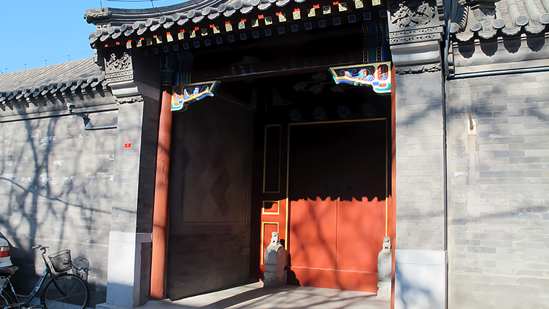 The gate of an old and luxurious house in Hutong