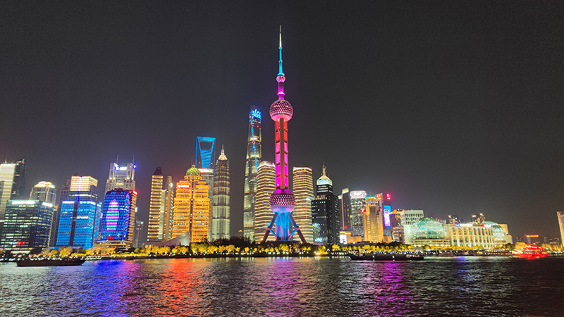 The Oriental Pearl Tower lights up in pink at night