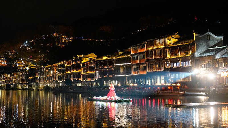 A performance on the river at night