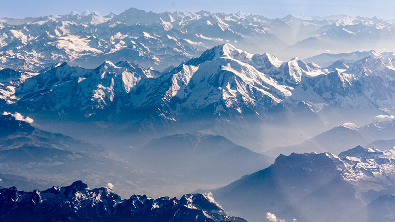 Admire Mount Everest through airplane window