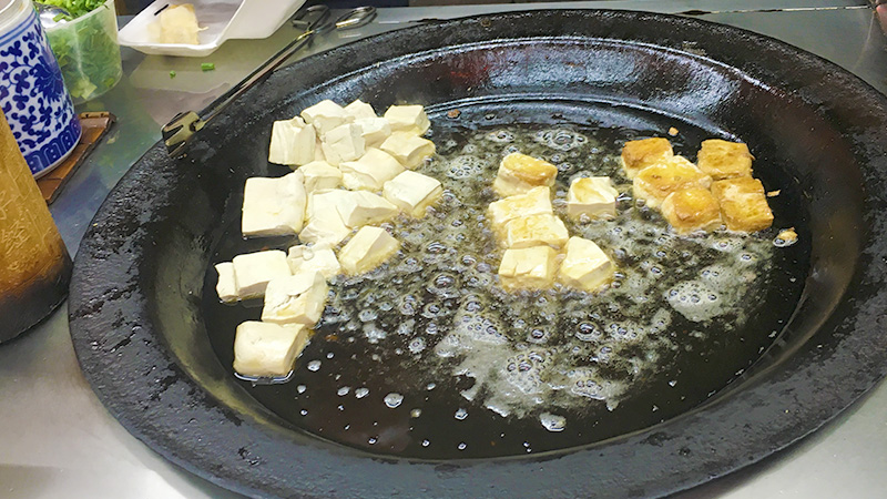 A fresh-made serving of Hairy Tofu in Huangshan